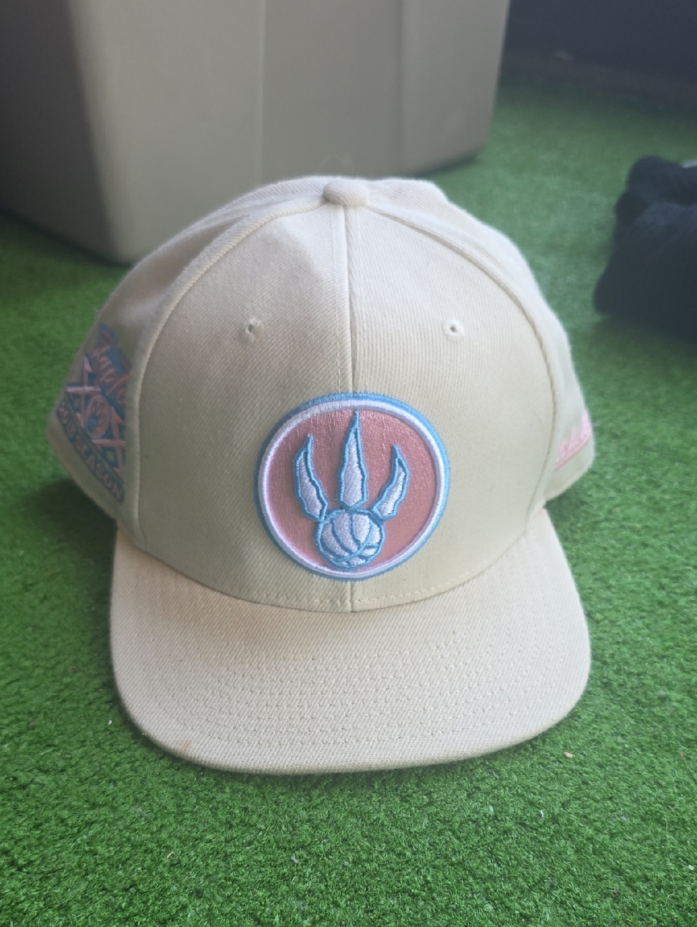 Raptors Beige Basketball Hat with Pink & Blue Embroidered Logo Unisex